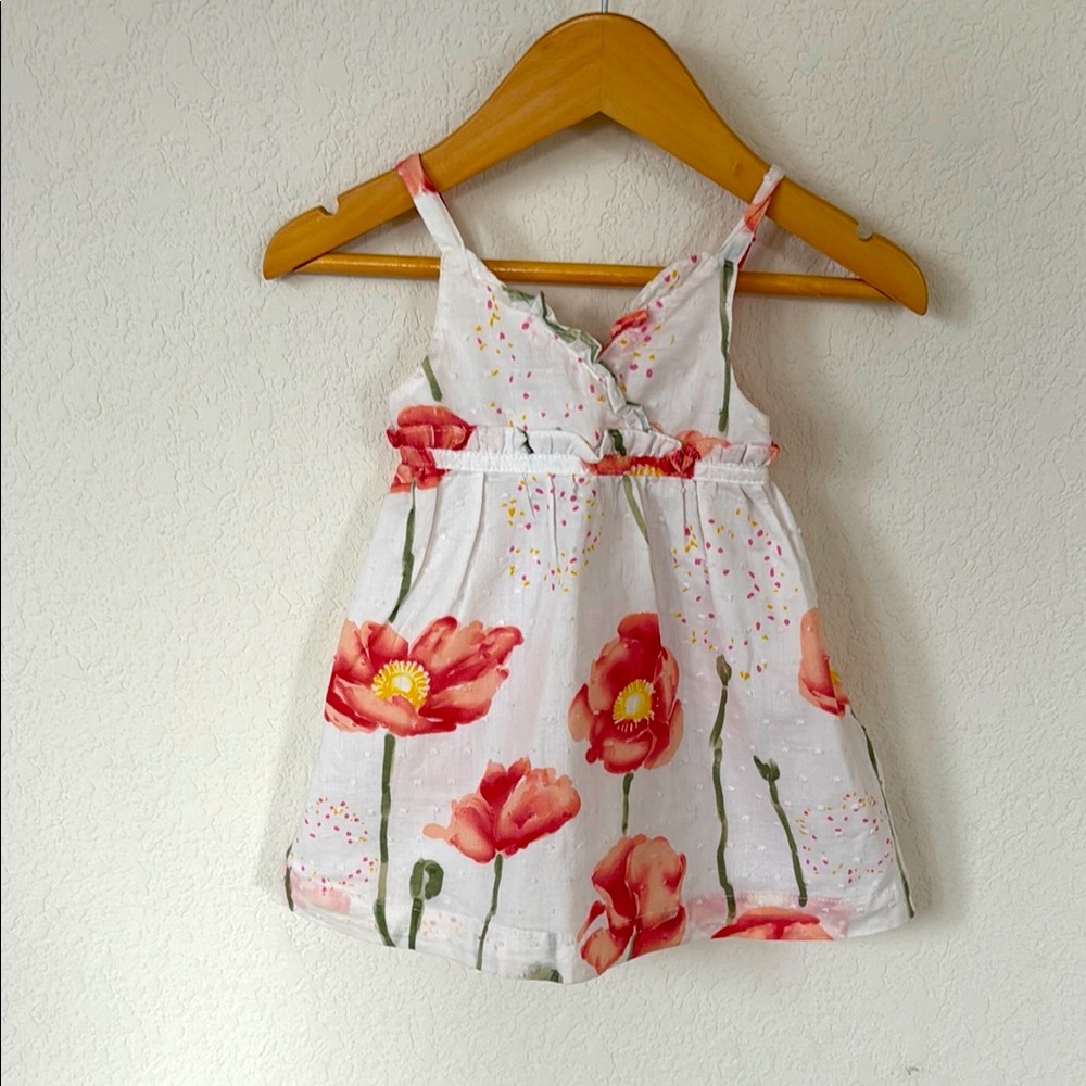 Penelope Mack • White Dress with Swiss Dots and Red & Green Floral Detailing